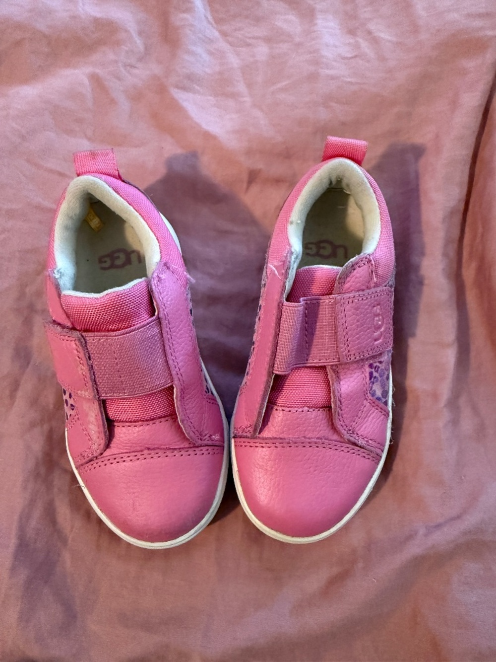 Pink UGG kids sneakers with velcro straps